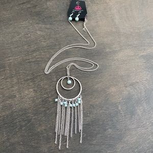Light blue faux Pearl long silver necklace with matching earrings.